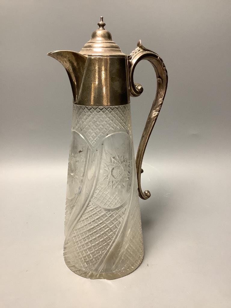 An Edwardian silver mounted cut glass claret jug, James Deakin & Sons Ltd, Sheffield, 1901, height 29.5cm (chipped).